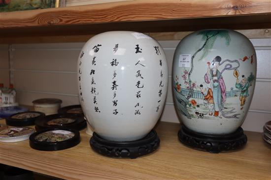 Two Chinese famille rose jars, lacking covers, associated hardwood stands height 27cm excluding stands